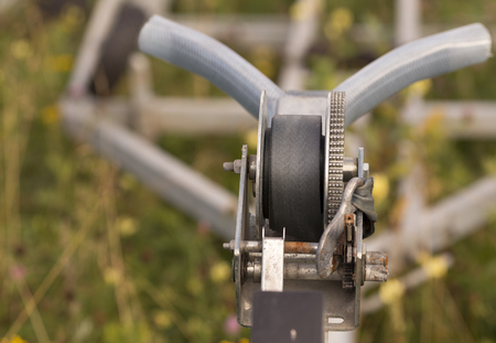 A close up on a boat winch on a trailer