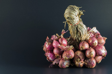 shallots black backgroundの写真素材