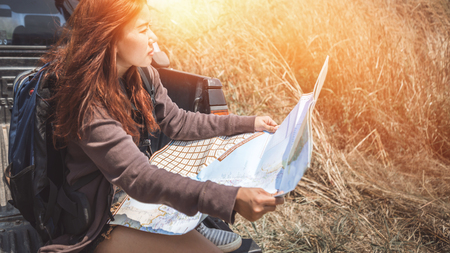 Drive pickup car Travel. Female travelers travel nature mountain map navigationの写真素材