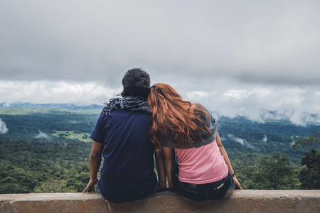 Lover women and men asians travel relax in the holiday. Take a scenic ride on the mountain. Thailandの写真素材