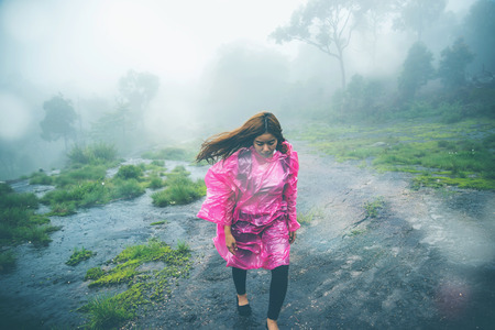 Asian women travel. Morning atmosphere nature Forests. walk in the forest rainy season. puhinrongkla Thailandの写真素材