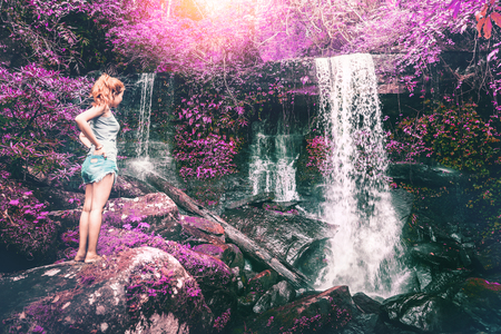 woman asia travelers travel. Walking hand travelers travel nature Forests, mountains, waterfalls. puhinrongkla 
romklao-paradorn waterfallの写真素材