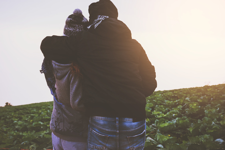Lover women and men asians travel relax in the holiday. Stand up look landscape on the mountain in the morning. Thailandの写真素材
