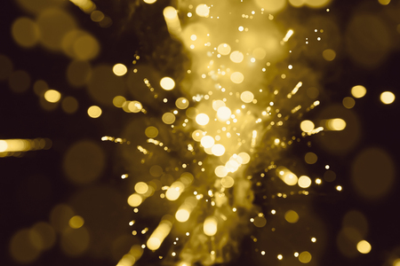Abstract background. Gold-colored blur. Fireworks circle blurの写真素材