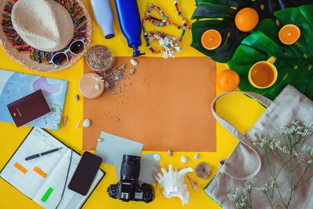 Beach outfit Accessories On bright yellow background - Summer Holiday Banner, Beach tourism concept. Summer concept, Travel nature, Travel relax, Beach Summer.の写真素材