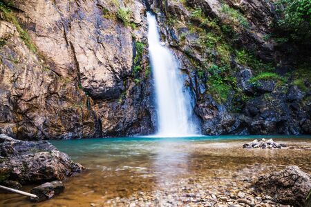 Natural background Landscape photo jogkradin in the deep forest at Kanchanaburi in Thailand. Emerald waterfall, travel nature, Travel relax, Travel  Thailand, Waterfall picture, Landscape photo.の写真素材