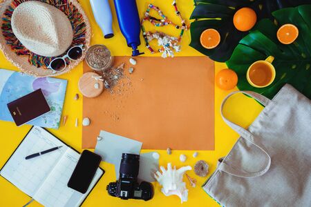 Beach outfit Accessories On bright yellow background - Summer Holiday Banner, Beach tourism concept. Summer concept, Travel nature, Travel relax, Beach Summer.の写真素材