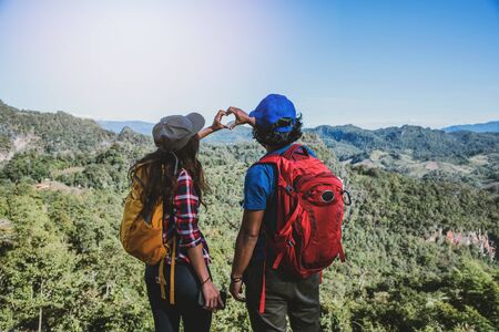 Travel, nature travel of Asian couples while is relaxing outdoors during his trip in Thailand.の写真素材