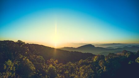 Mountain peaks in fog scenery landscape, Mountain hill sunrise sky clouds