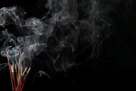 white smoke on black backgroundの写真素材