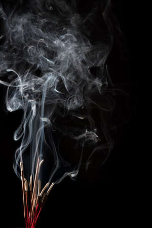 white smoke on black backgroundの写真素材