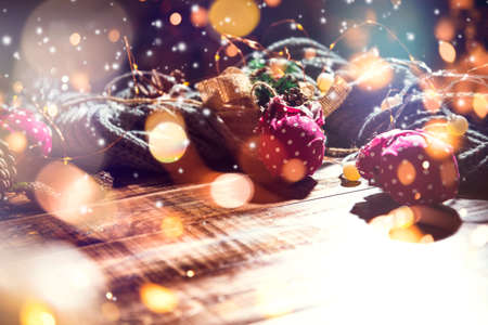Christmas decoration balls and ornaments over abstract bokeh background with copy space. Holiday background greeting card for Christmas and New Year. Merry Christmasの写真素材