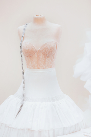 wedding dress on a mannequin during the making of a new collectionの写真素材