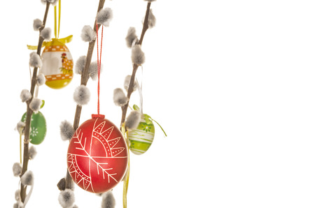 Egg tree with vase for Easter isolated against white backgroundの写真素材