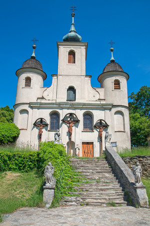 Abandoned church with statue of the crucifixion of Jesus Christの写真素材
