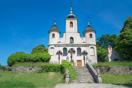Abandoned church with statue of the crucifixion of Jesus Christの写真素材