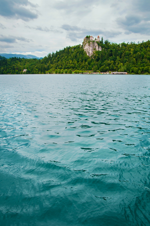 Bled castle with lake in foreground in Sloveniaの写真素材