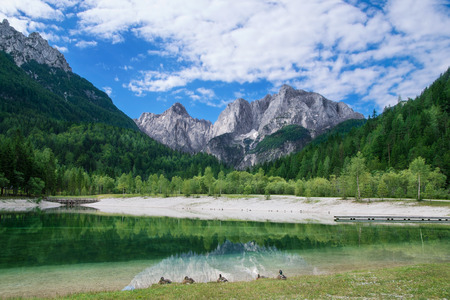 View of the Julian Alps from Kranjska Gora with Jasna Lake in Sloveniaの写真素材