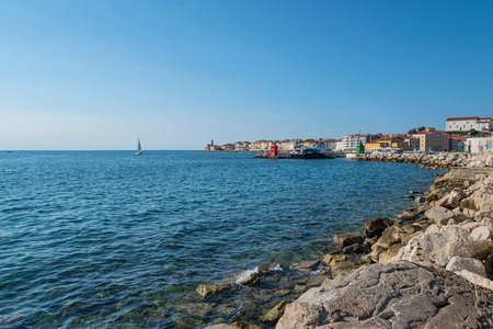 Port of Piran with boats in Sloveniaの写真素材