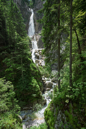 Martuljek waterfalls surrounded by forest near Gozd Martuljek, Sloveniaの写真素材