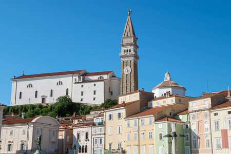 Church of St. George in Piran surrounded by mediterranean houses, Sloveniaの写真素材
