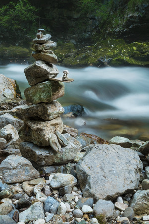 Stone stack in Vintgar gorge and Radovna river near Bled in Sloveniaの写真素材