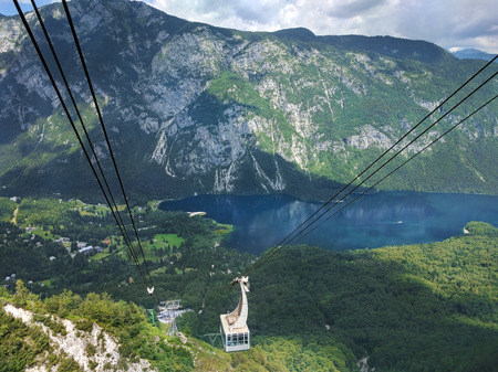 Cable car goes up to the top of the mountain Vogel in Bohinj, Sloveniaの写真素材