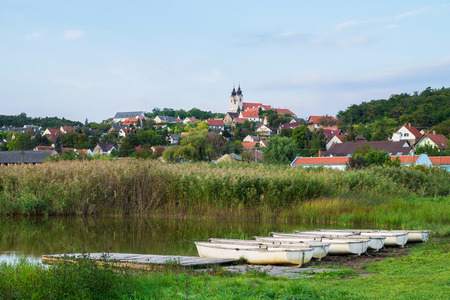Inner Lake in Tihany with boats and Tihany Abbey in Hungaryの写真素材