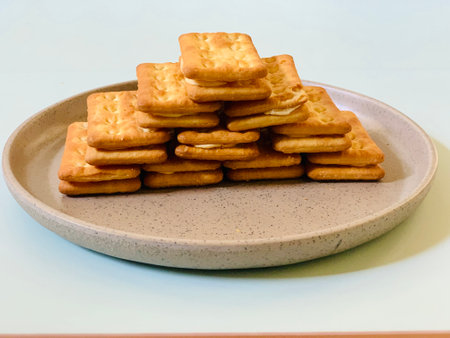 Biscuits in a plate on a white background, close-upの写真素材