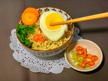 boiled noodles with egg as a side dishの写真素材
