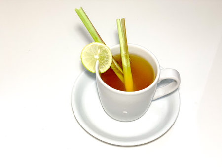 Cup of tea with lemon on a white backgroundの写真素材