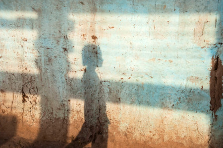 Girl shadow on a wall in Bodhgayaの写真素材