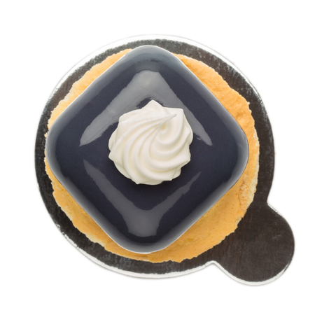 French mousse cakes on cookies covered with dark glazeの写真素材