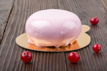 French mousse cake covered with pink glazeの写真素材