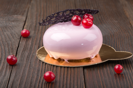 French mousse cake covered with pink glazeの写真素材