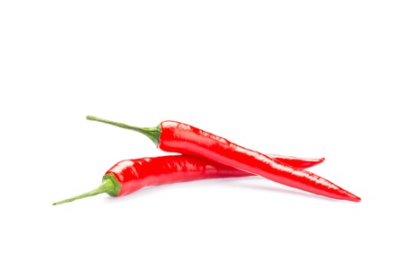 Two pods of red hot chili pepperの写真素材