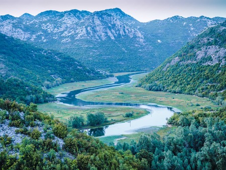 Mountain valley in the sunset in Serbia drowning in the hazeの写真素材