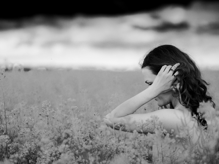 beautiful russian girl in a canola field