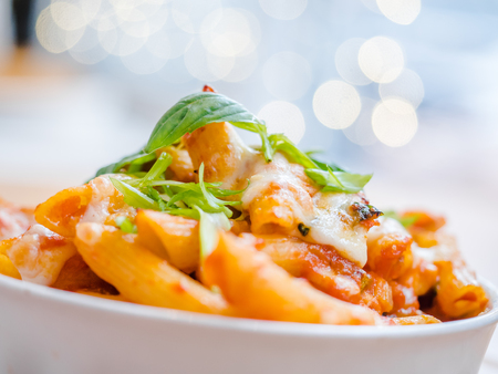 pasta rigatoni with herbs and cheeseの写真素材