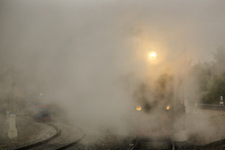 the Soviet locomotive rushes along the ways in the morning