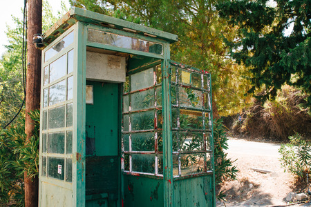 The old abandoned telephone booth on a Cyprusの写真素材
