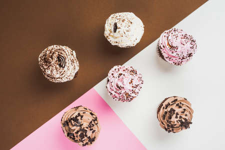 Abstract colorful donuts bakery, sweet concept background with place for text. Top view. Glazed...