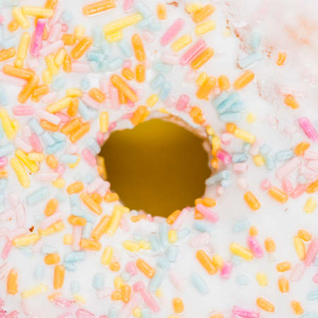 Abstract colorful donuts bakery, sweet concept background with place for text. Top view. Glazed donuts on color background.の写真素材