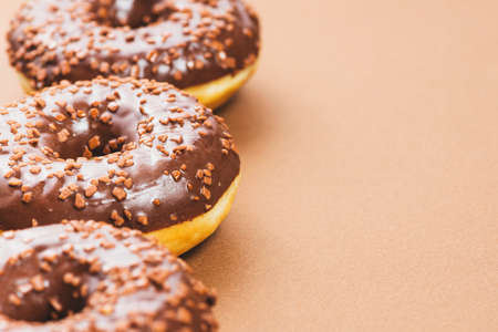Abstract colorful donuts bakery, sweet concept background with place for text. Top view. Glazed donuts on color background.の写真素材