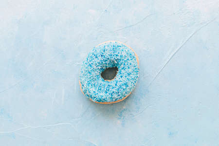 Abstract colorful donuts bakery, sweet concept background with place for text. Top view. Glazed...