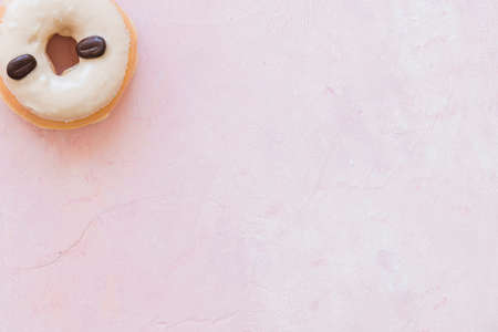 Abstract colorful donuts bakery, sweet concept background with place for text. Top view. Glazed...