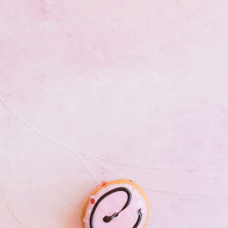 Abstract colorful donuts bakery, sweet concept background with place for text. Top view. Glazed donuts on color background.の写真素材