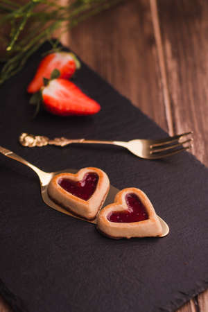 Sponge cake roll with chocolate and strawberryの写真素材