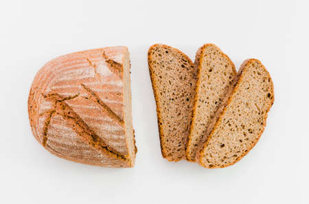 Different baking buns, croissants, gingerbread cookies. Delicious freshly baked bread on wooden...