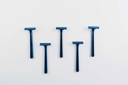 Shaver and shaving foam and towel. Shave concept background with place for text.の写真素材